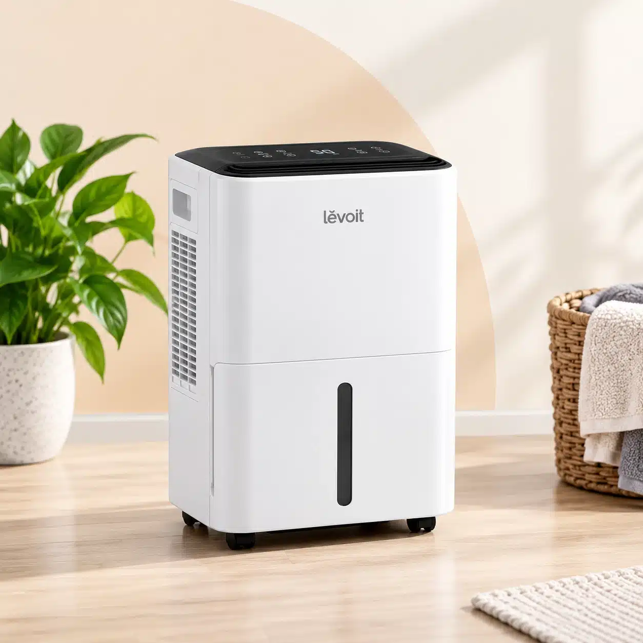 White portable dehumidifier in a living room
